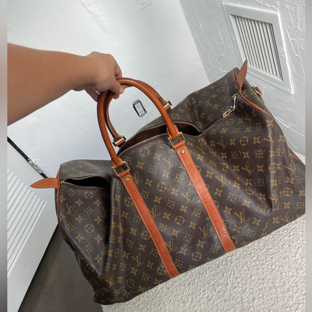 AUTHENTIC LOUIS VUITTON TRAVEL DUFFLE.